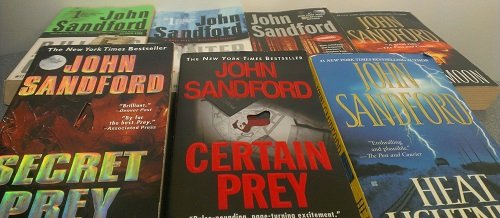 7 Volumes of John Sandford Paperback Novels: Dark of the Moon, Secret Prey, Certain Prey, Rules of Prey, WInter Prey, Rough Country, Heat Lightning